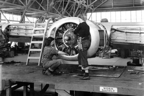 Women working on airplane